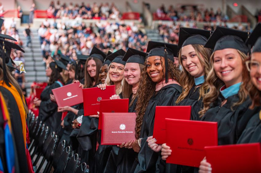 group of students celebrating during commencement